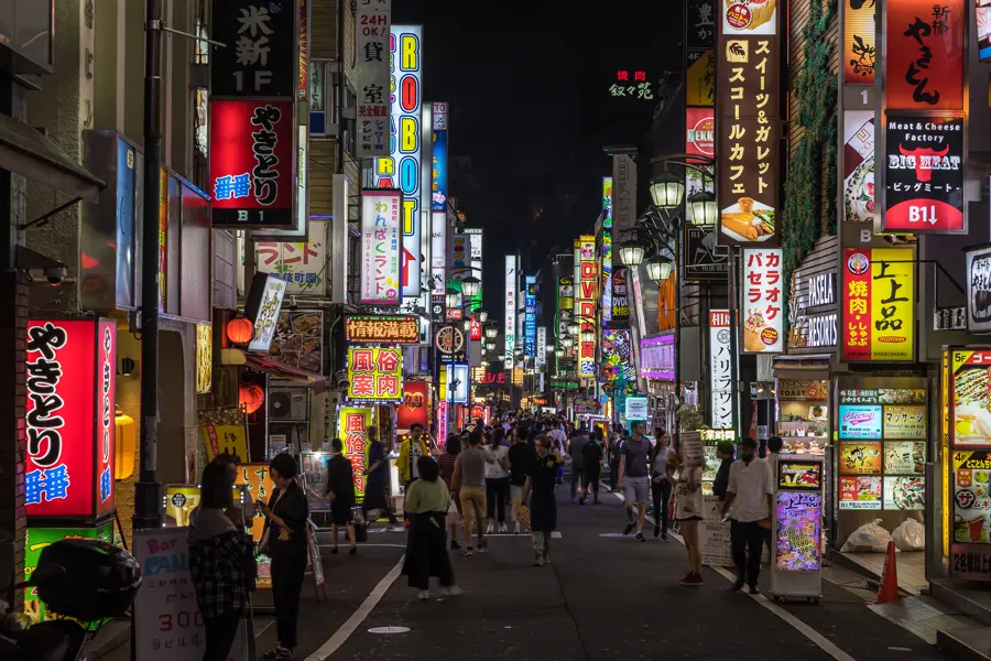 Colourful neon signs above a street in Kabukichō, Shinjuku